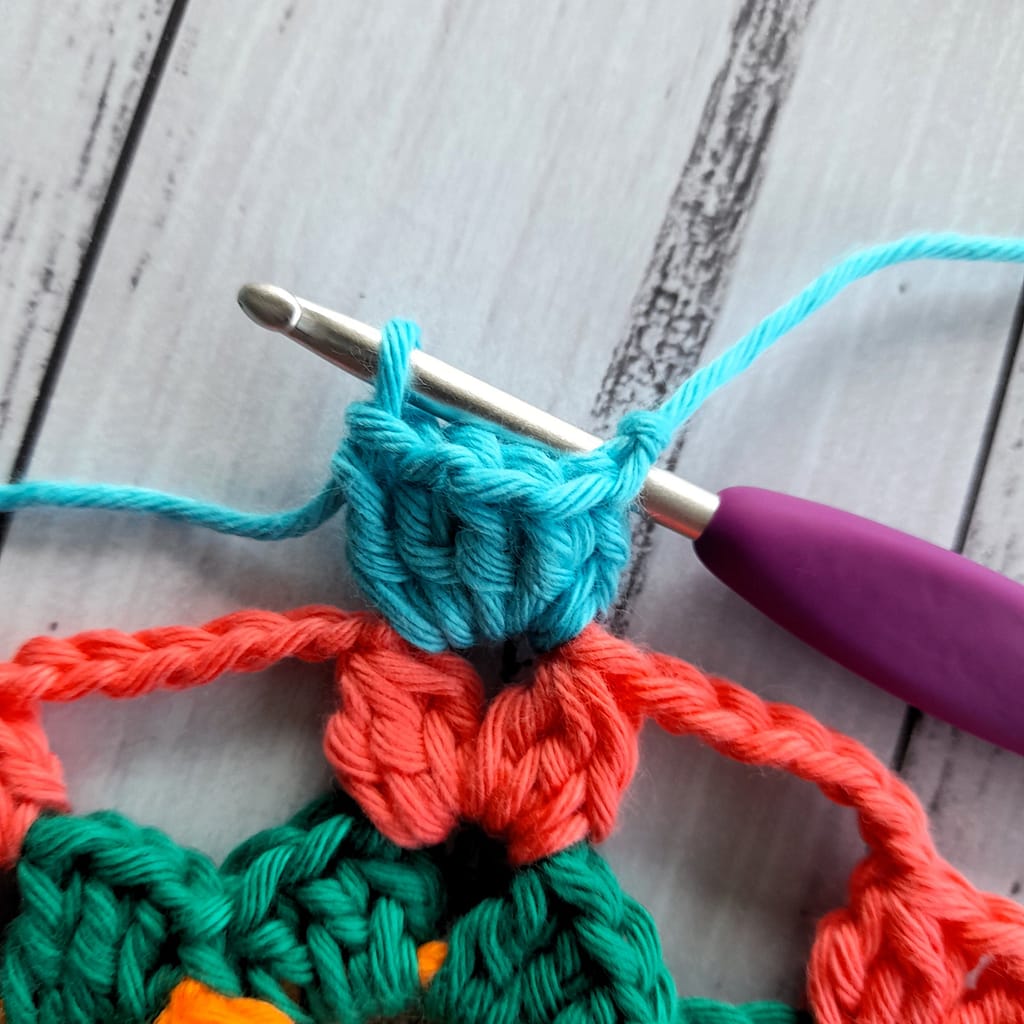 3rd step in creating a popcorn stitch