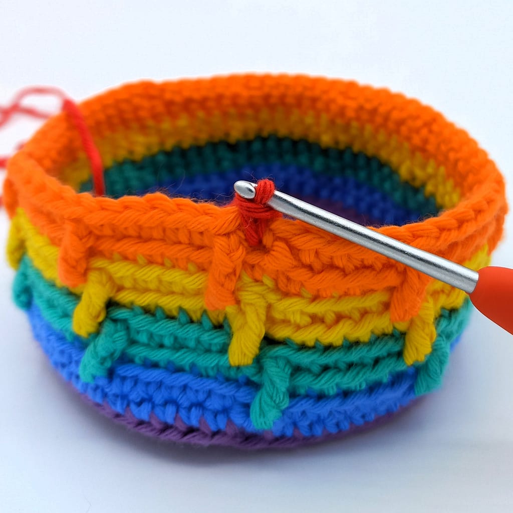 rainbow crocheted basked in progress