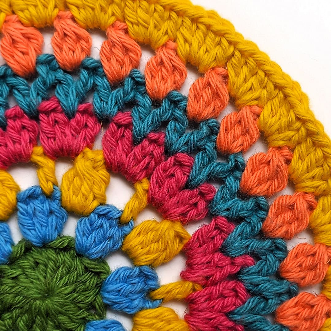crochet mandala round 7 showing quarter segment of circle only