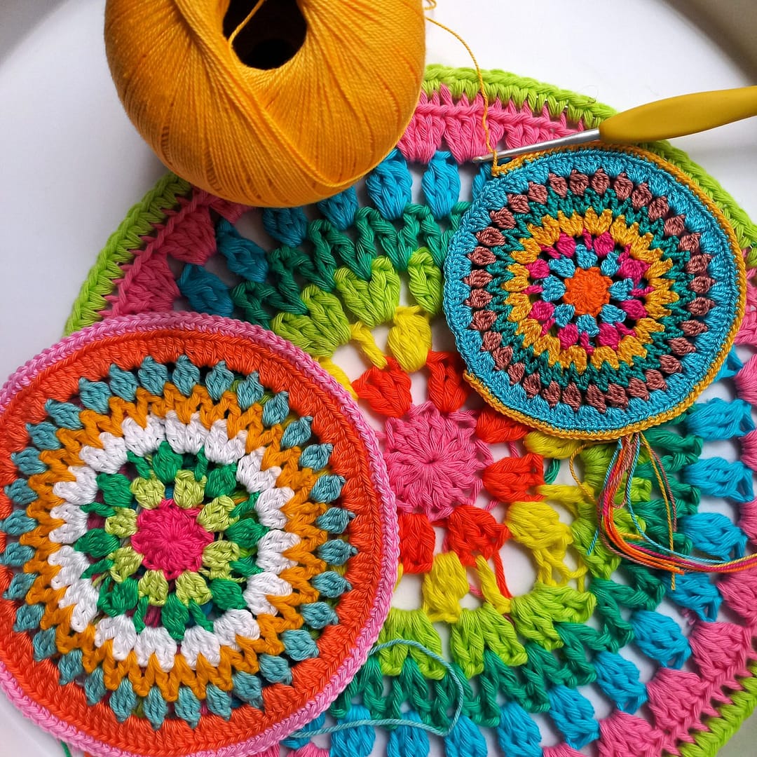 very colourful crochet mandalas in different sizes